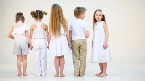 Five cute children staying with the back to the camera isolated 動画素材 22735178