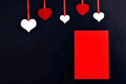 Five decorative hearts of different sizes and colors. Decorative hearts tied  Stock Photos