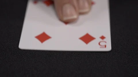 Five of Diamonds playing card, moving on a luxury black background 4k. Stock Footage 95564337