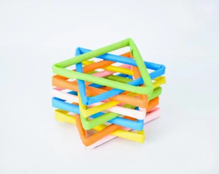 Five different colored stars made of color papers isolated on a white backgro Stock Photos
