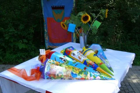 Five different designed school cones lie on table Stockfoto's