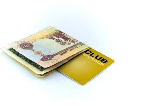 Five dirham note and gold membership club card on white background Stock Photos