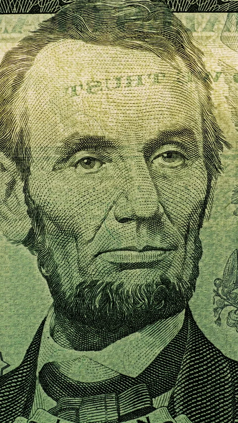 Five dollar bill security light over Lincoln portrait. Video stock 345720200