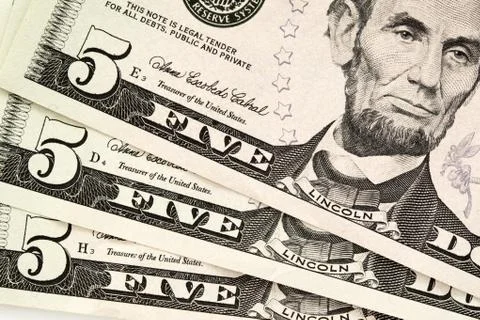 Five dollar bills Stock Photos