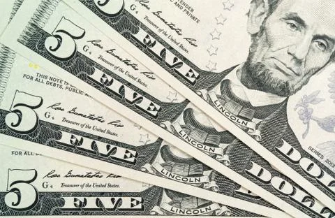 Five dollar bills Stock Photos