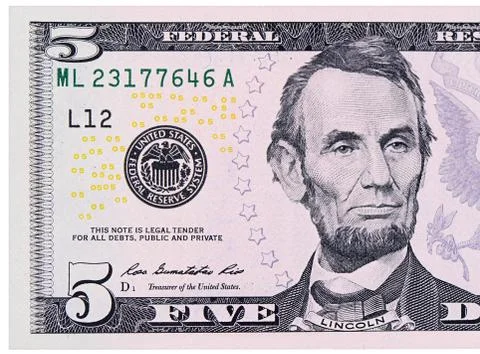 Five dollars isolated on white background Stock Photos