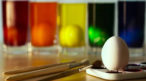Five Easter Eggs in Color Thick Glass Tumblers Stock Footage 61743585