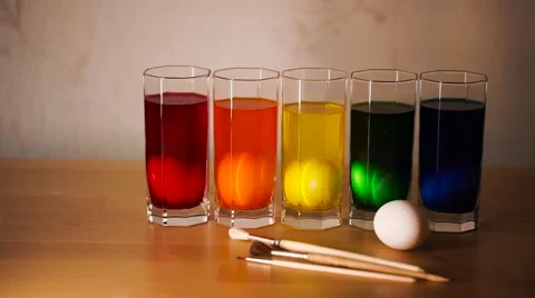 Five Easter Eggs in Color Thick Glass Tumblers Stock Footage 61743650