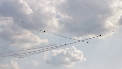 Five fighter jets in the blue sky. A general plan. Aerobatic figures. Airshow. 9 Stock Footage 124146108