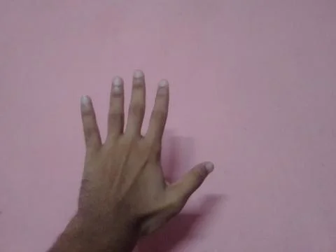 Five Fingers With Pink Wall Stock Photos