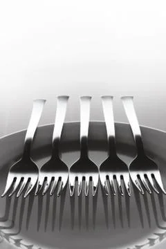 Five forks and a dish Stock Photos
