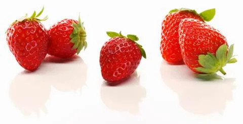 Five fresh strawberries Stock Photos
