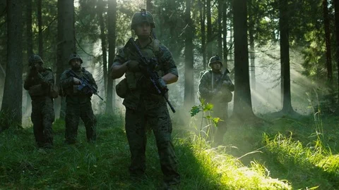 Five Fully Armed Soldiers Stand Alert with Guns Ready. Military Operation. Stock Footage 82108608