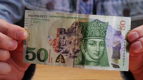 Five Georgian lari banknotes close-up. Universal currency converter GEL Central Stock Footage 274742253