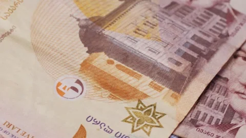 Five Georgian lari banknotes close-up. Universal currency converter GEL Central Stock Footage 279587897