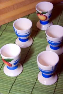 Five glasses on eggs Foto stock