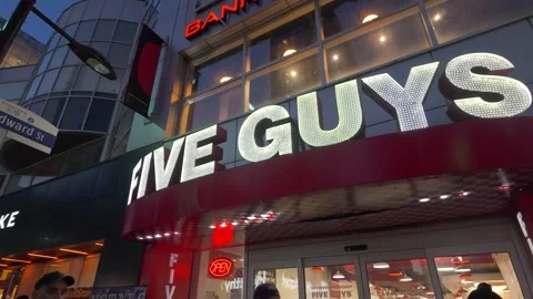 Five Guys burger restaurant in Toronto Canada - TORONTO, ONTARIO - APRIL 15 Stock Footage 274448553