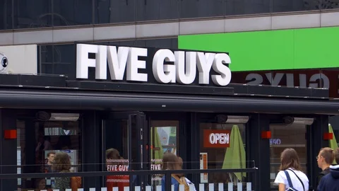 Five Guys fast food restaurant in La Defense business district in Paris France Stock Footage 127635181