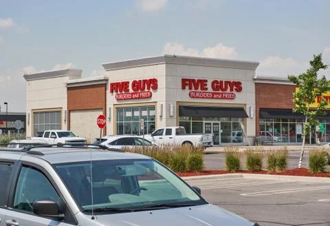 Five Guys storefront. Stock Photos