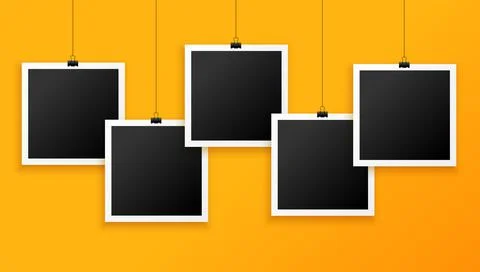 Five hanging photo frames on yellow background Illustrazione stock