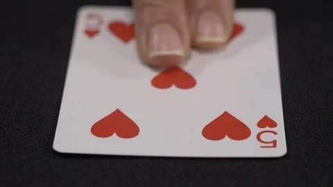Five of hearts playing card, moving on a luxury black background 4k Stock Footage 95417932
