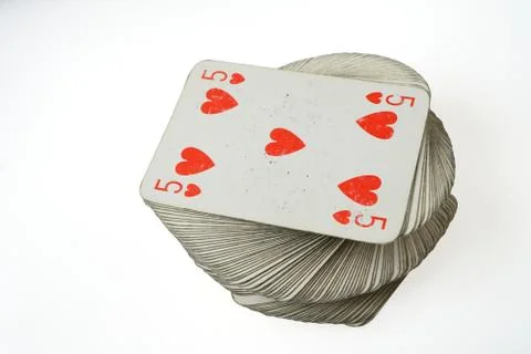 Five of Hearts at the top of playing card deck Stock Photos