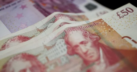 Five Hundred Euro Notes And Fifty Great Britain Pounds - European Currency Stock Footage 114854130
