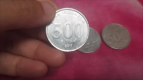 Five hundred rupiah coins Stock Footage 291471795