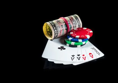 Five of a kind cards combination and dollars with chips. Winning combination Stock Photos