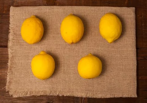 Five lemons on napkin Stock Photos