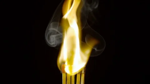 Five matches igniting and burning, Ultra Slow Motion Stock Footage 86576095