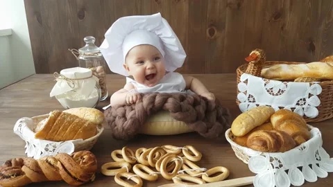Five month old baker on baking background Stock Footage 157126357