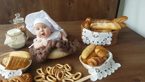 Five month old baker on baking background Stock Footage 157126386
