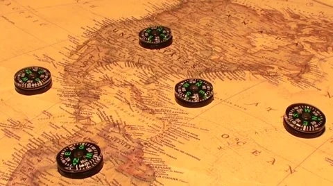 Five moving compass on map Stock Footage 47419530