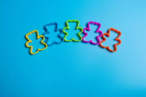 Five multi-colored plastic cookie cutter for making cookies in the shape of a 写真素材