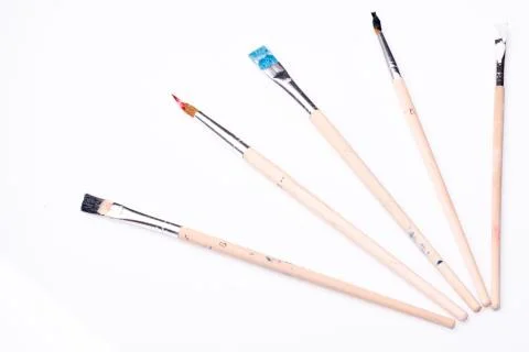 Five paintbrushes on a white background Stock Photos