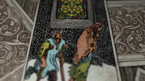 Five Of Pentacles Tarot Card shows People Walking Through Wind And Snow Stock Footage 164861856