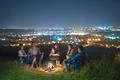 The five people rest near bonfire. night time Photo
