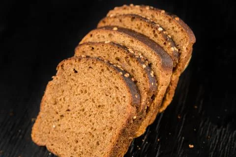 Five pieces of black bread Stock Photos