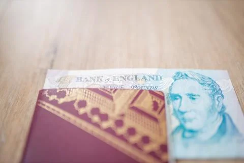 Five Pound Note Inside a Swedish Passport Stock Photos