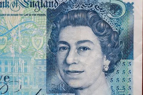 Five pound note shows portrait of Queen Elizabeth in blue color Stock Illustration