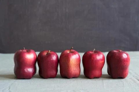 Five red apples on grunge background 写真素材