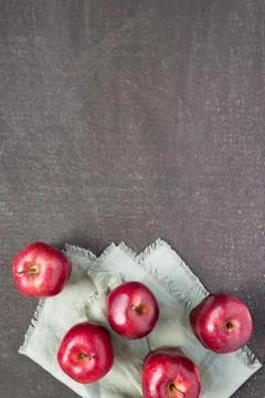 Five red apples on a painted background Stock Photos
