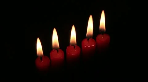 Five red candles on black Stock Footage 11022279