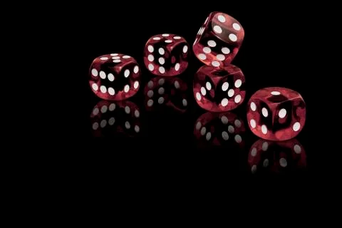 Five red dices on black background 스톡 사진