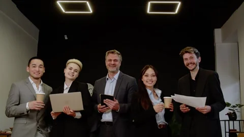 Five representative business members formal wearing communicating indoors Stock Footage 256665275
