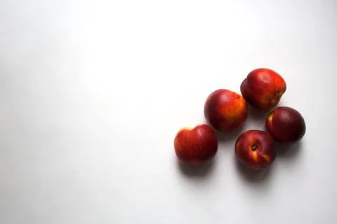 Five ripe nectarines with copy space Stock-Fotos