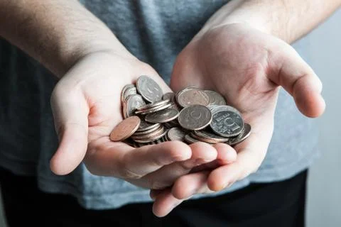 Five-ruble coin in man's hands Stock Photos