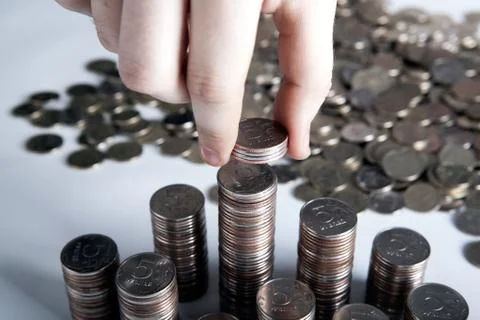 Five-ruble coin in man's hands Stock Photos