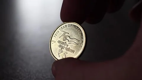 Five rupee indian coin in mans hands. Stock Footage 270245920